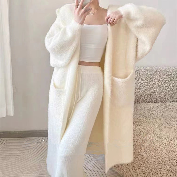 Kvinder Fluffy Cardigan med Praktiske Lommer og Casual Snit Stilla