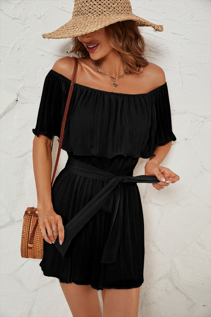 Dame Off-Shoulder Playsuit med flydende folder og figursyet bælte Stilla