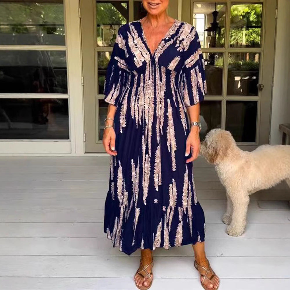 Dame Maxikjole med elegant V-udskæring og flydende skirt Stilla