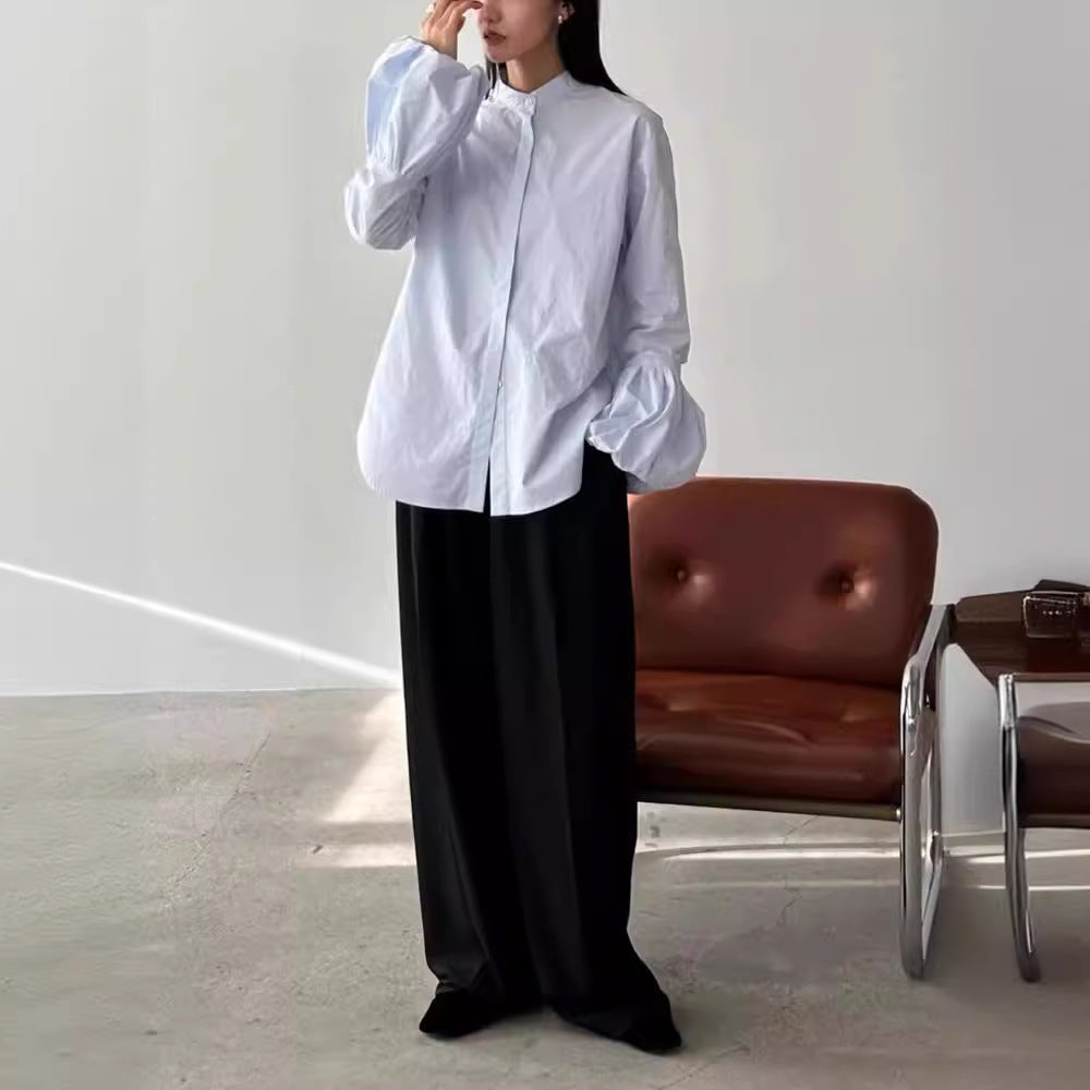 Kvinders elegante bluse med voluminøse ærmer og stående krave Stilla