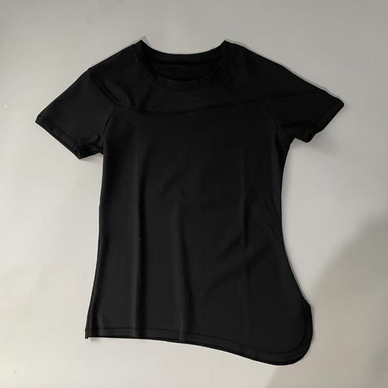 Dame Sports kortærmet T-shirt med innovativ asymmetrisk snit og åndbare egenskaber Stilla