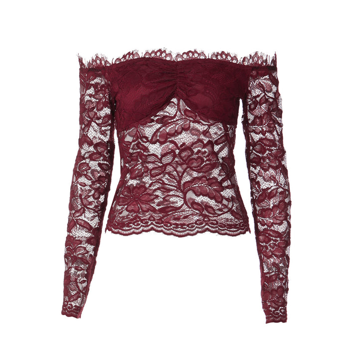 Dame spidsetop med off-shoulder design og ruffledetaljer Skovae