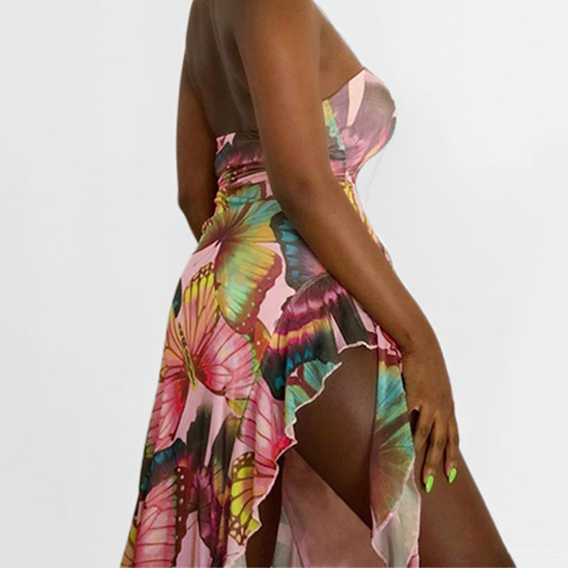 Dame strapless kjole med asymmetrisk snit og livligt sommerfuglemønster Stilla