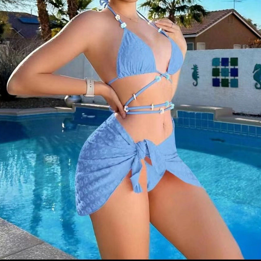 Dame triangel-bikini med moderigtig indpakningsskørt Skovae