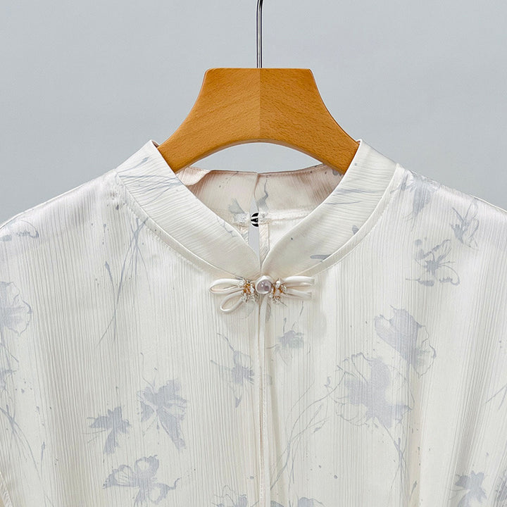 Damebluse med blomsterdesign og raffineret rynkeelement Stilla