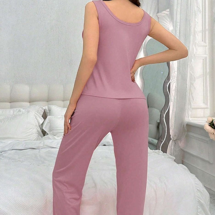 Femme Cozy Lounge Set med knaplukning-oberdel og justerbare snoretrækbukser Stilla
