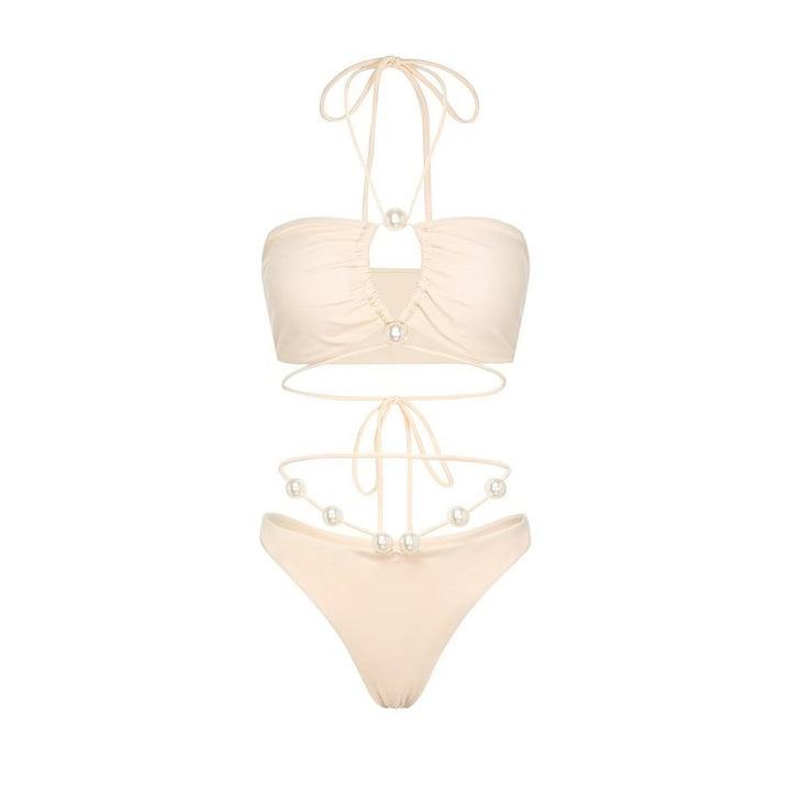 Dame bikini-sæt med modedetalje af perler og elegant nederdel Stilla