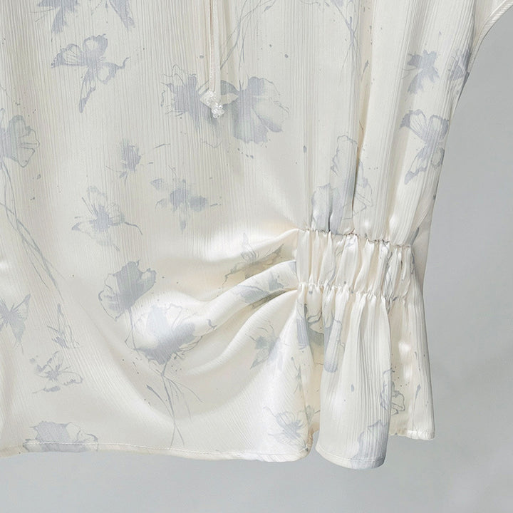 Damebluse med blomsterdesign og raffineret rynkeelement Stilla