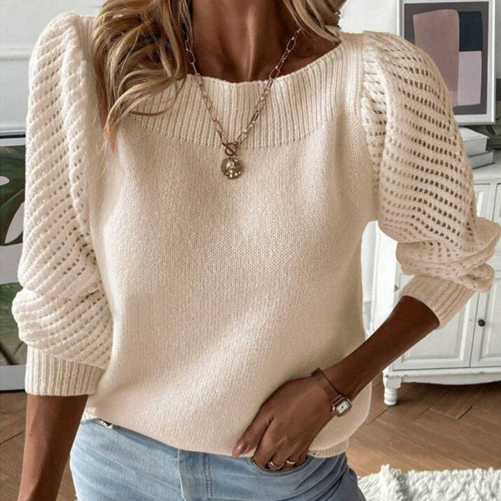 Kvindes strikket sweater med fashionable hulærmer og rund hals Stilla