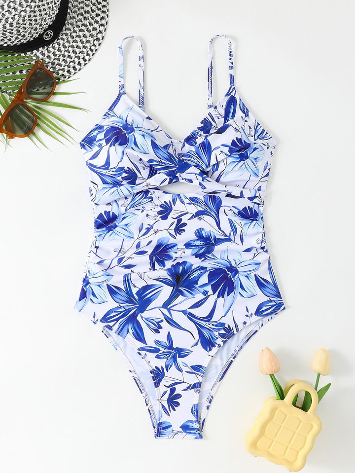 Dame ensartet badedragt med blomstret design og raffineret cut-out Stilla