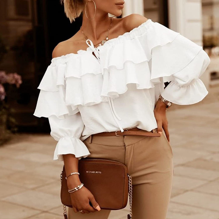Kvinder legesyge top med flæse design og off-shoulder skæring Stilla