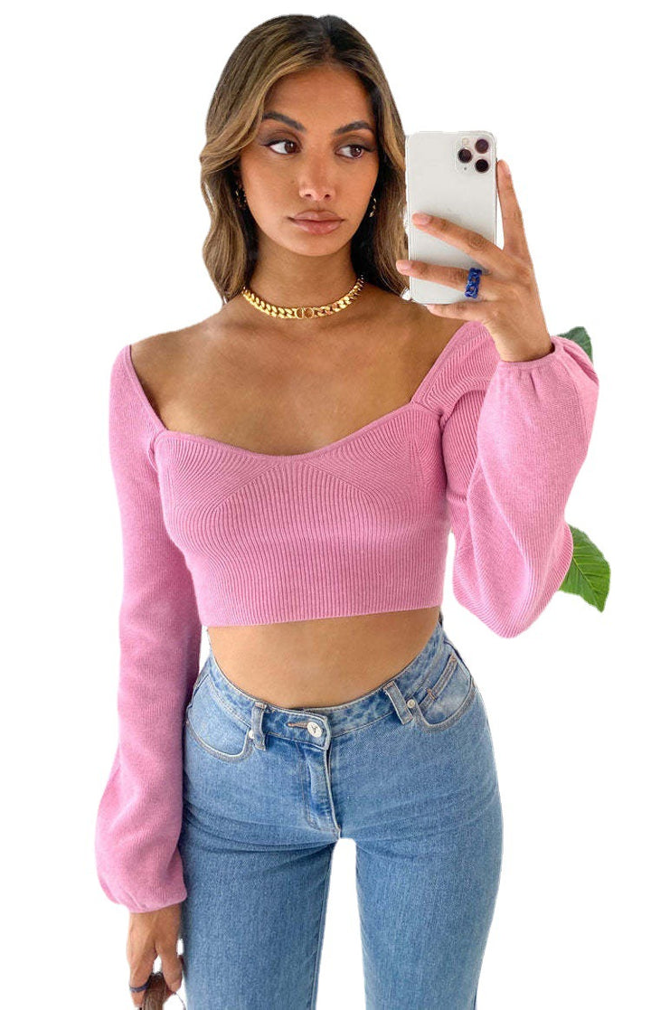 Damer elegant cropped top med smart ribstruktur og brede ærmer Skovae