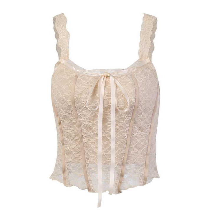 Dame spids-crop-top med dekorative bånd og fine detaljer Skovae