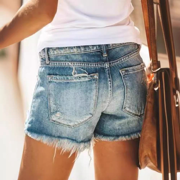 Dame trendy Destroyed Denim-shorts med frynsede kanter og fashionable huldetaljer Skovae