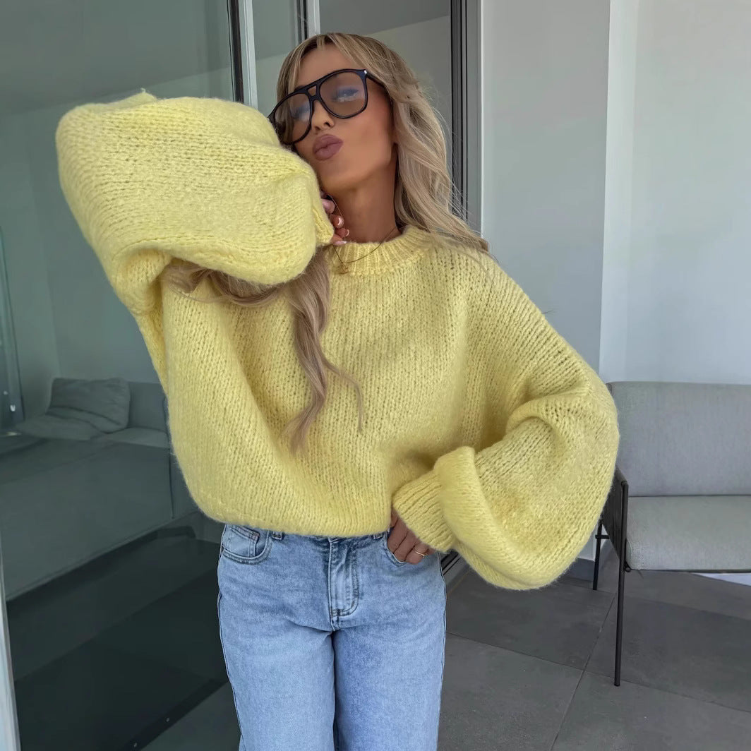 Kvinders oversized strikket sweater med voluminøse ærmer og moderne design Stilla