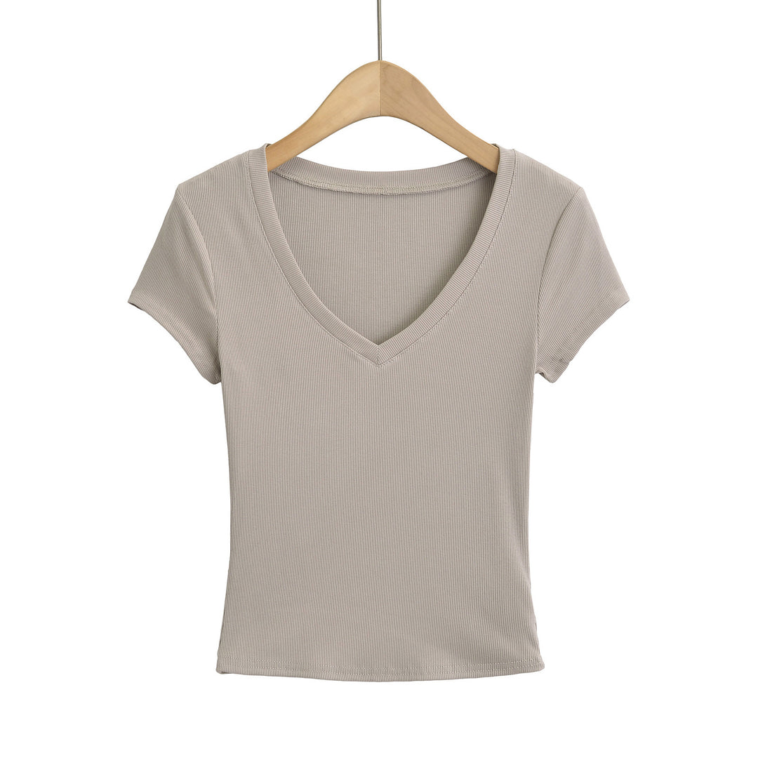 Dame cropped V-hals T-shirt i ribdesign med tætsiddende snit og korte ærmer Stilla