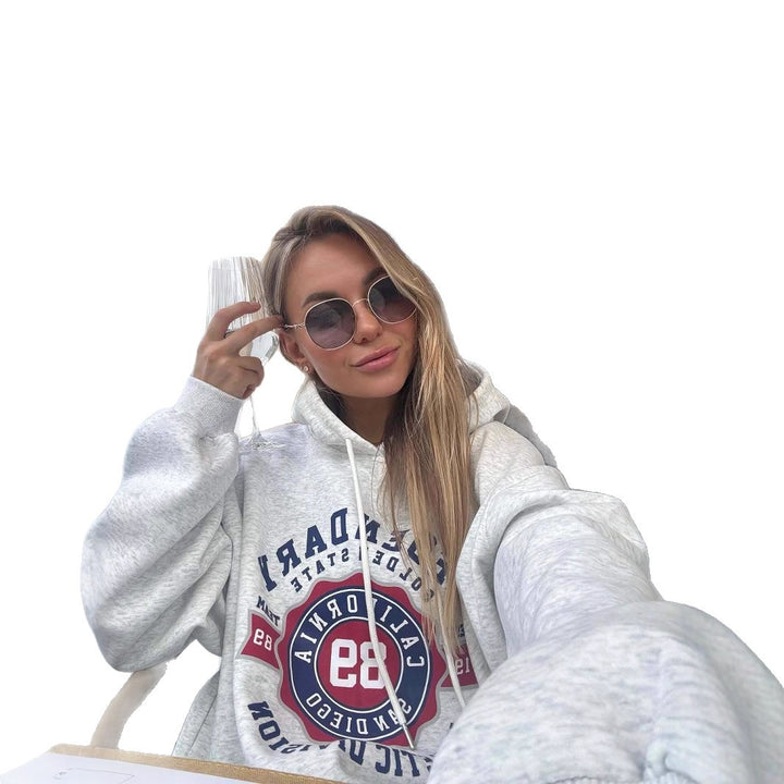 Kvinders komfortable hætte sweatshirt med sporty grafisk print og loose fit Stilla