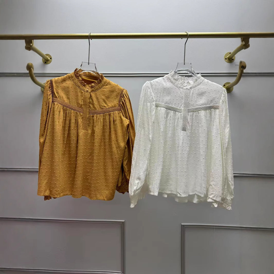 Damebluse med elegant krave og raffinerede pufærmer Stilla