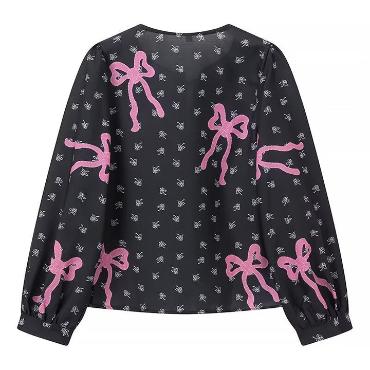 Damebluse med legende sløjfedesign og raffinerede detaljer Stilla