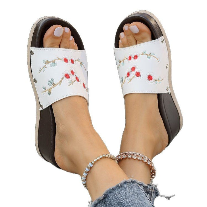 Dame wedge-pantoletten med floralt broderidesign og skridsikker sål Stilla