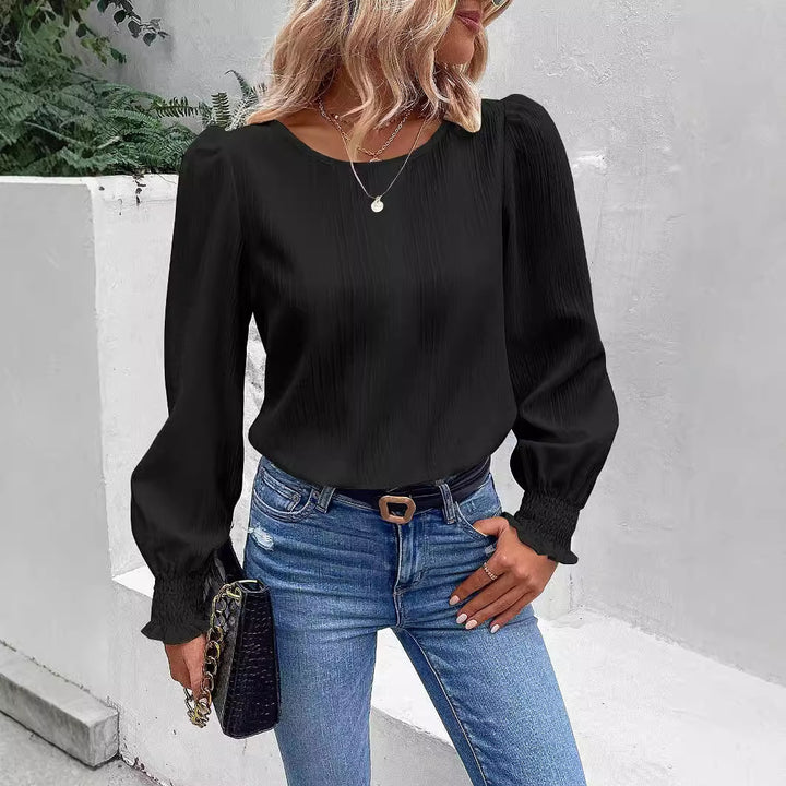 Damer elegant bluse med ribstruktur og puffærmer Stilla