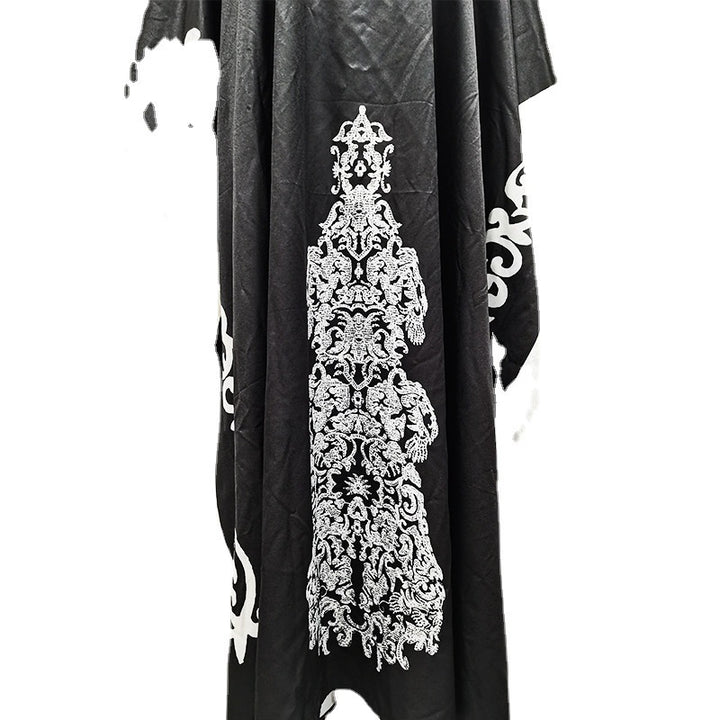 Dame Kaftan med kunstnerisk broderidesign og vidt svajende ærmer Stilla