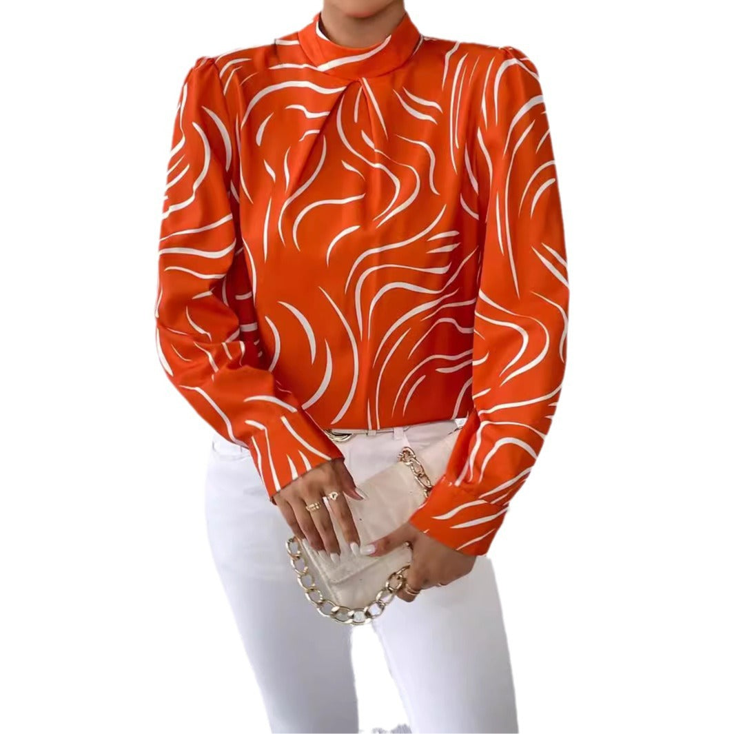 Damebluse med elegant bølgedesign og højhæftet krave Stilla