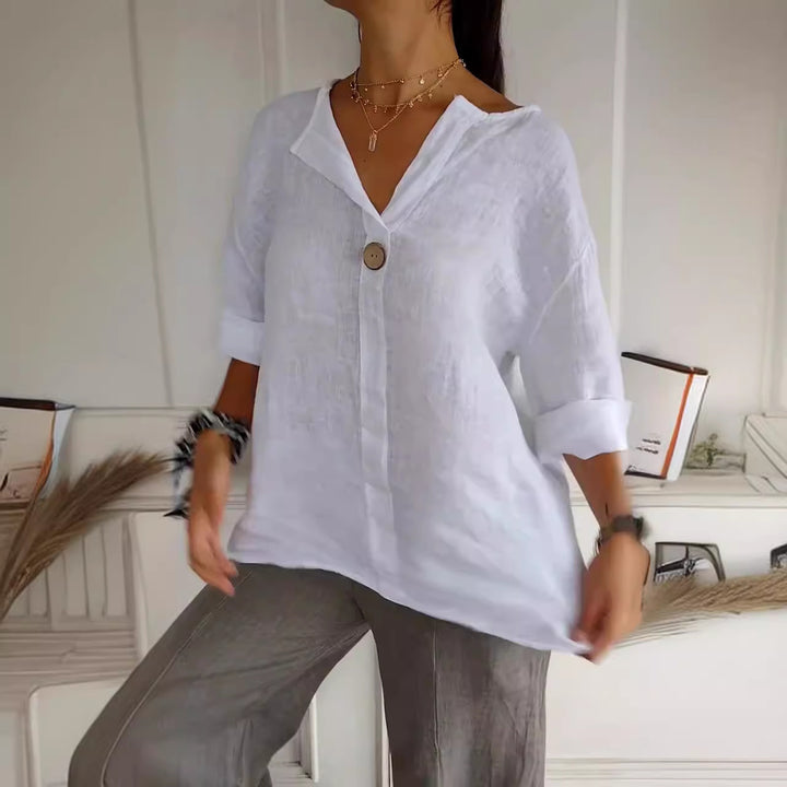 Dame linned blouse med knapdetalje og praktiske lommer Stilla
