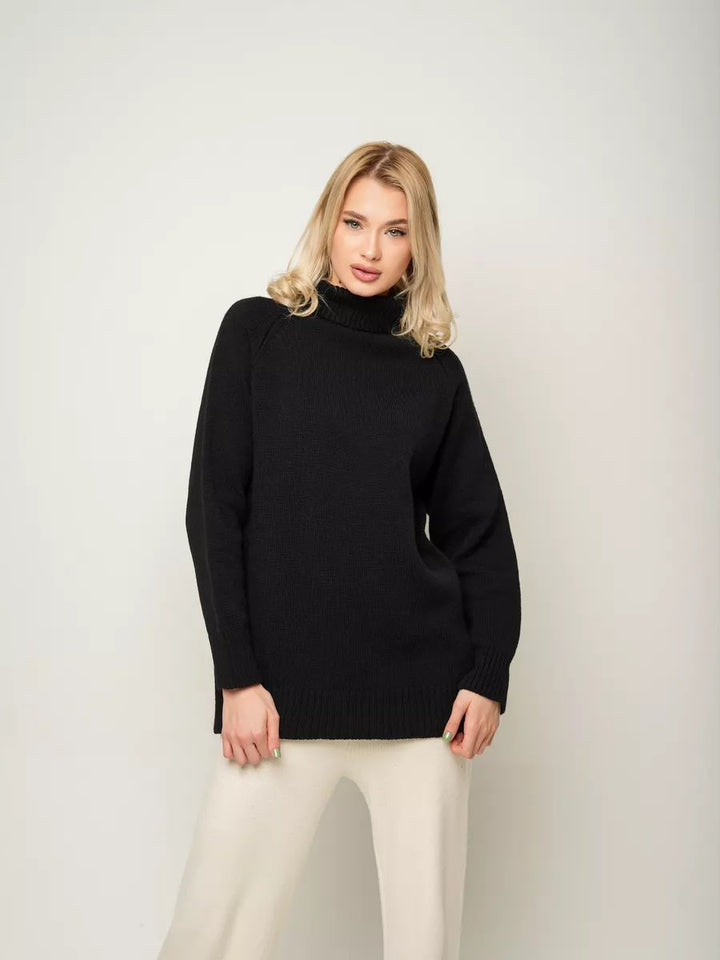 Dame afslappet rullekravepullover med sidelidsdetaljer og struktureret design Stilla