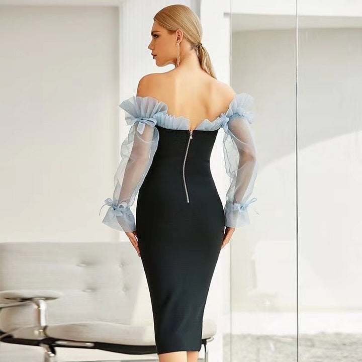 Dame Midi-kjole med skulderfri design og transparente puffærmer Stilla