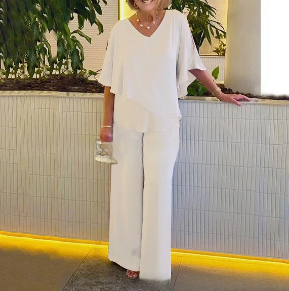 Dame elegant kombination af flydende overdel og vide buksedesign Stilla