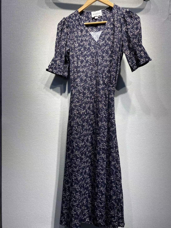 Dame Maxikjole med floralt design og elegante pufærmer Stilla