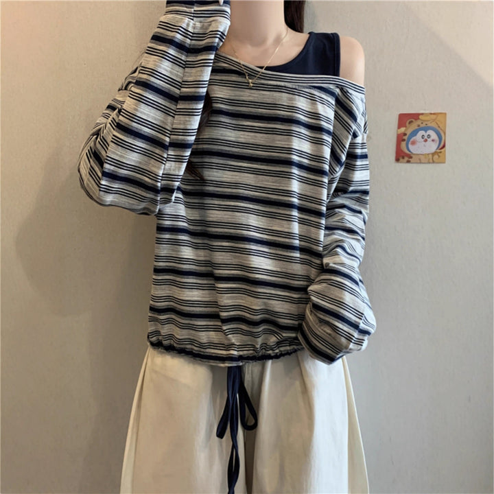 Kvinders afslappede skjorte med lange ærmer og off-shoulder design Stilla