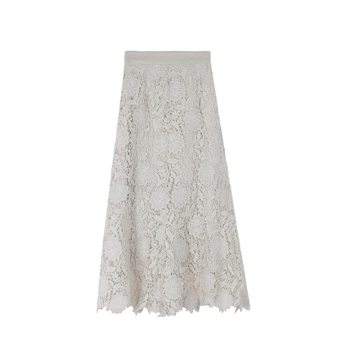 Dame spids maxiskørt med elegant blomsterdesign og transparente detaljer Stilla
