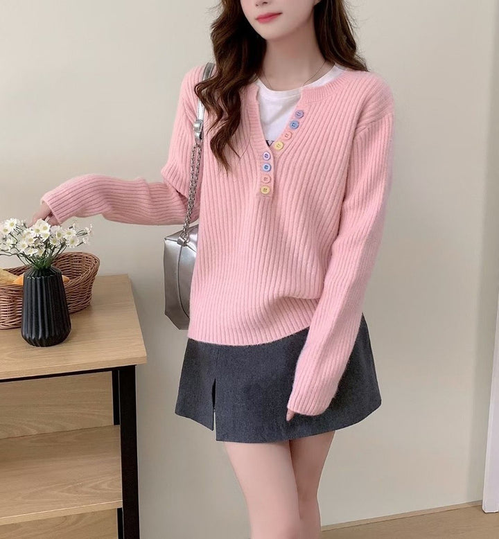 Kvinders hyggelige sweater med knapstolpe og rund hals