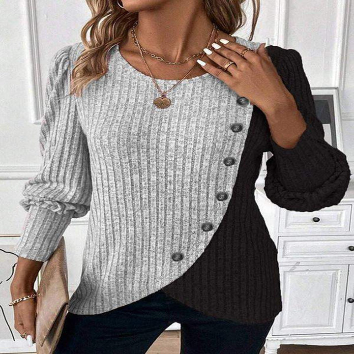 Kvinders sweater med asymmetrisk snit og knapdetaljer Stilla