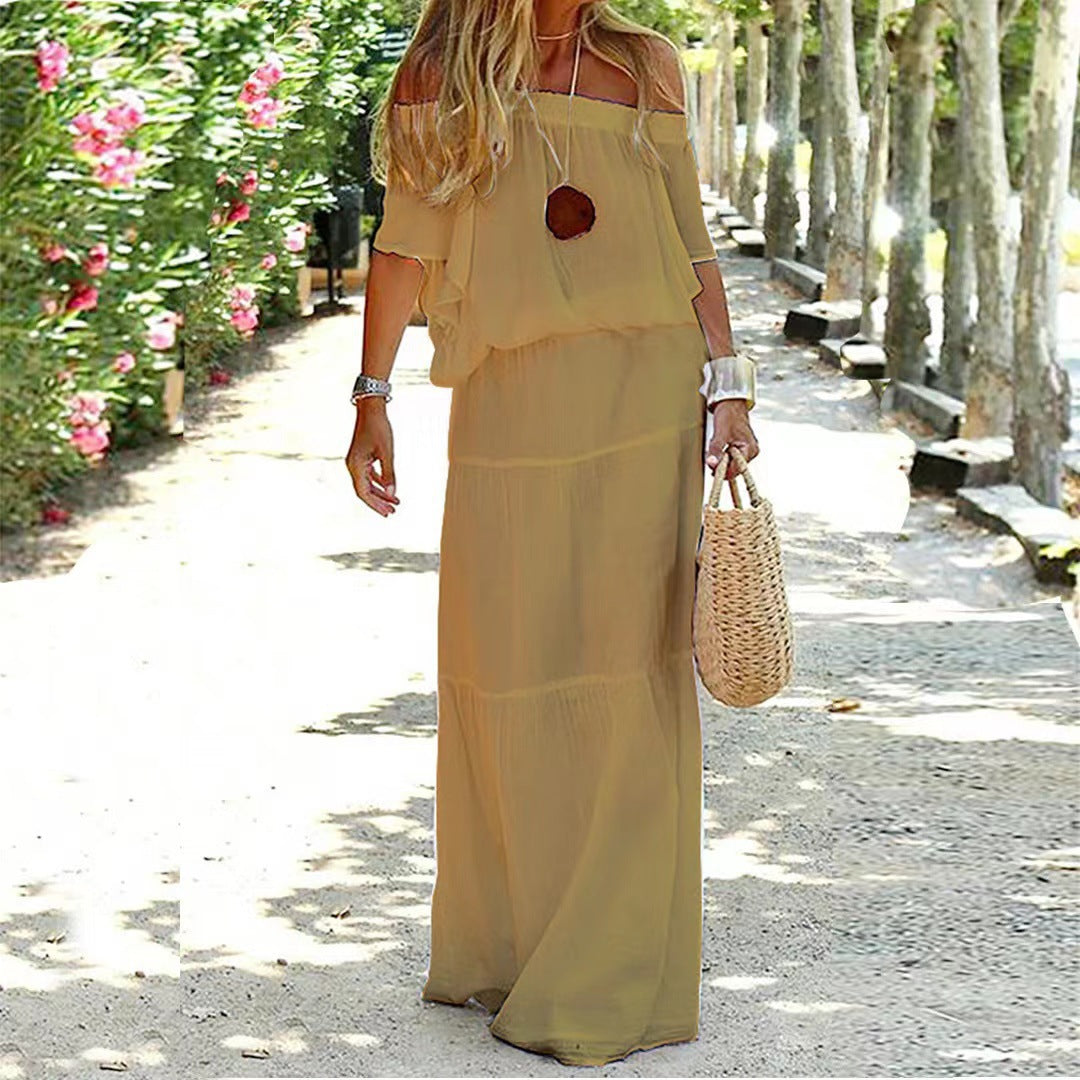Dame Off-Shoulder Maxikjole med flydende snit og elegante volangdetaljer Stilla
