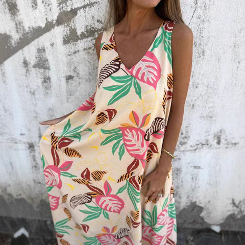 Dame maxikjole med blomster motiver og dyb V-udskæring Stilla