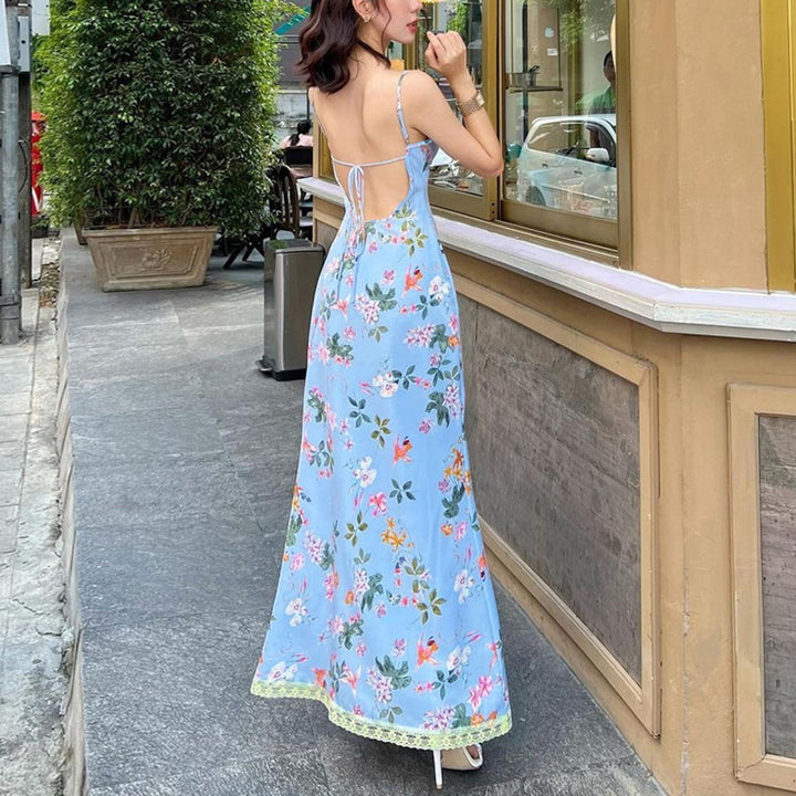 Dame maxikjole med blomstermønster og elegant rygudskæring Stilla