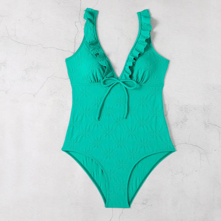 Dame one-piece badedragt med legende ruffle detaljer og dyb v-hals Stilla