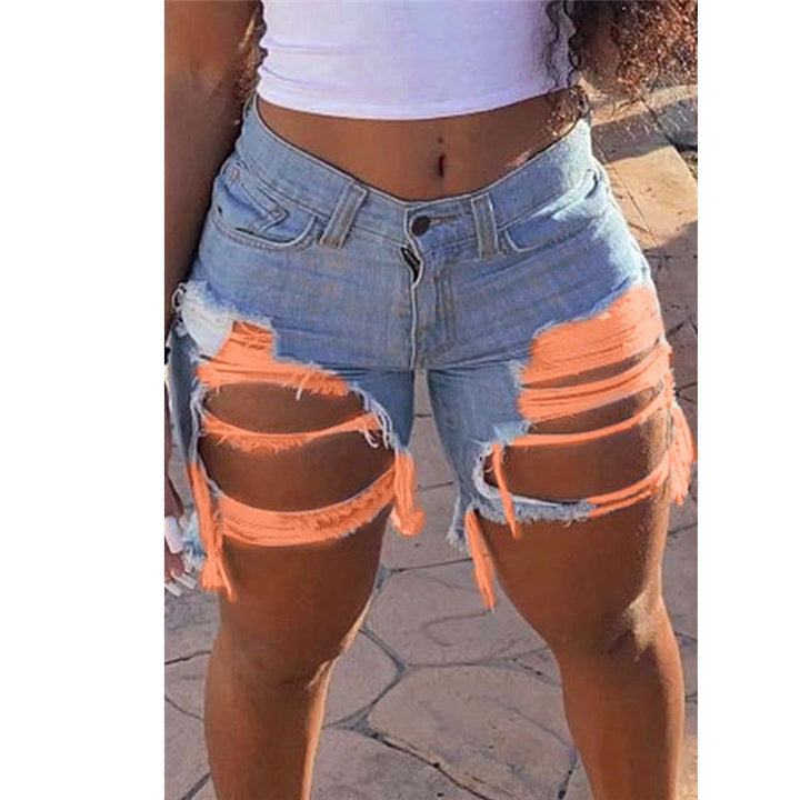 Dame Jeans-shorts med markante revnedetaljer og frynsende kant Stilla