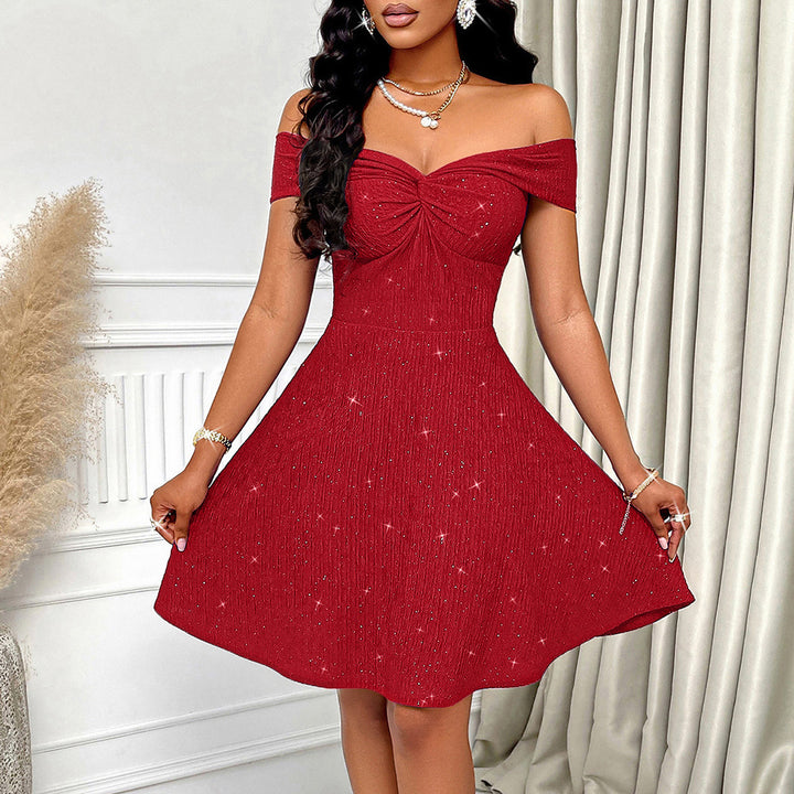 Dame elegant off-shoulder kjole med glitrende stof og flydende nederdel Stilla
