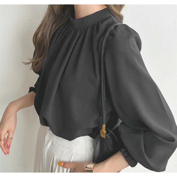 Kvindernes elegante bluse med voluminøse ærmer og opretstående krave Stilla