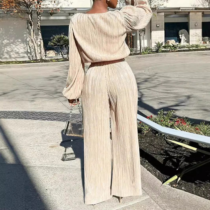 Dame Elegant plisseret jumpsuit med voluminøse ærmer og bredt ben Stilla