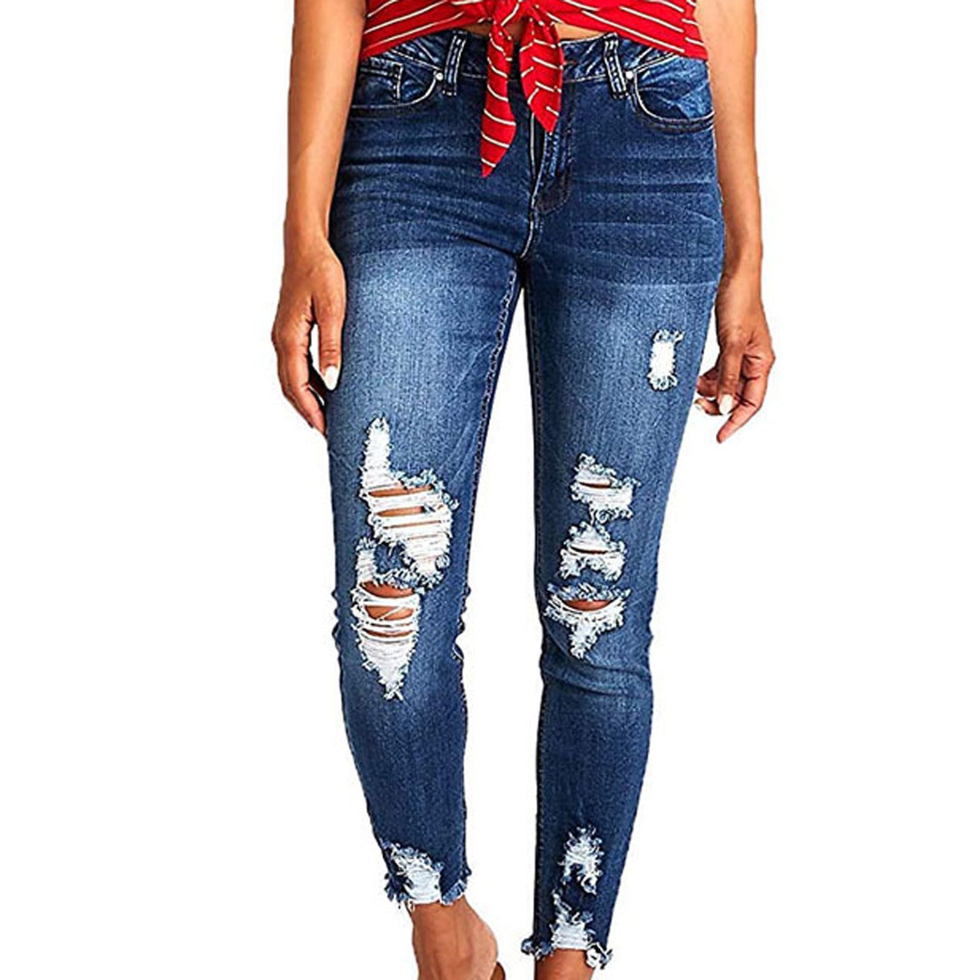 Dame Skinny Jeans med modetrend Destroyed-effekt og figurskærende snit Stilla