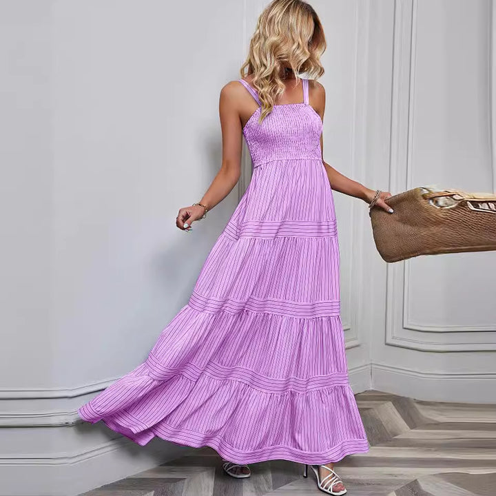 Dame maxi kjole med sofistikeret plisseret design og elastisk top Skovae