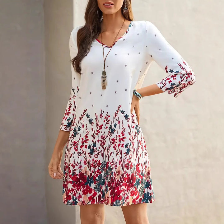 Dame fritidskjole med smart V-hals og floral print Stilla