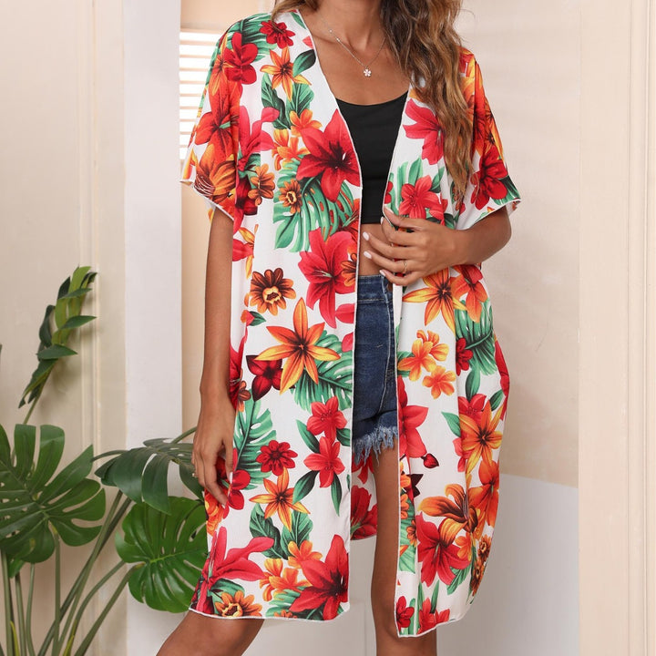 Damer let strandkimono med blomsterdesign og luftig, åben silhuet Stilla