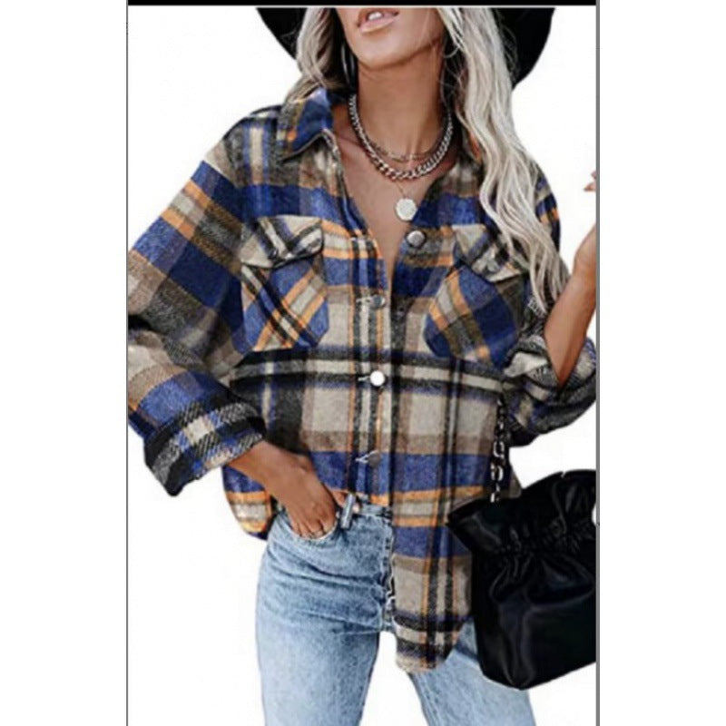 Dame ternet bluse i afslappet oversized stil med lommer Stilla