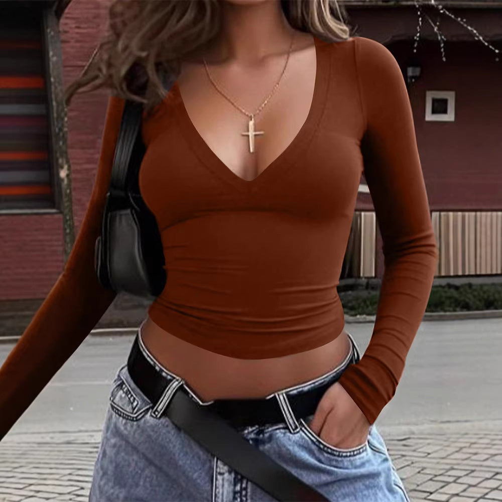 Dame cropped langærmet shirt med V-hals og elastisk materiale Skovae